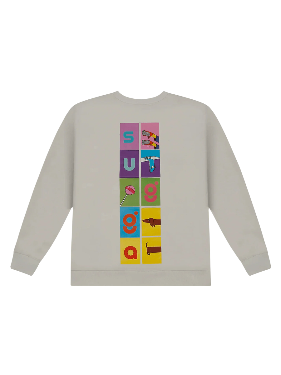 Beige streetwear sweatshirt with colorful block letters, candy, sneakers, and dog graphics on back.