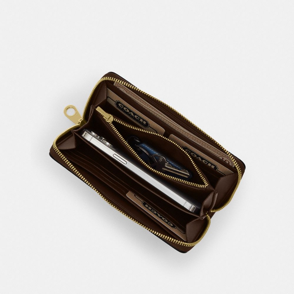 Coach Long Zip Around Wallet In Signature Canvas With Stripe Gold Tan Black