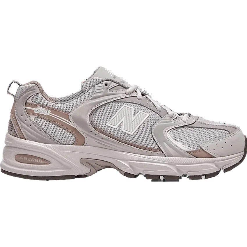 Grey and beige mesh New Balance 530 sneaker with white logo and ABZORB sole, side view