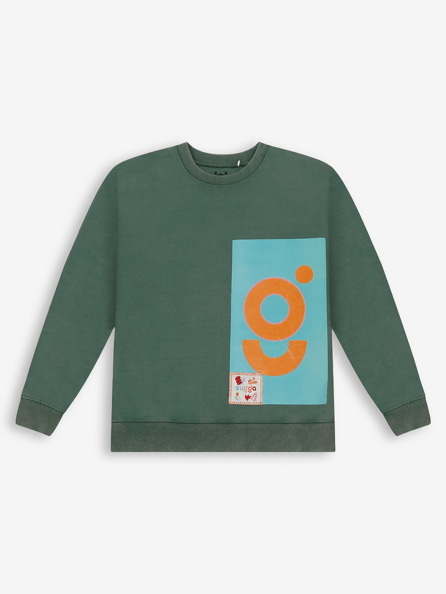 Green streetwear sweatshirt with orange and blue graphic print and small patch detail