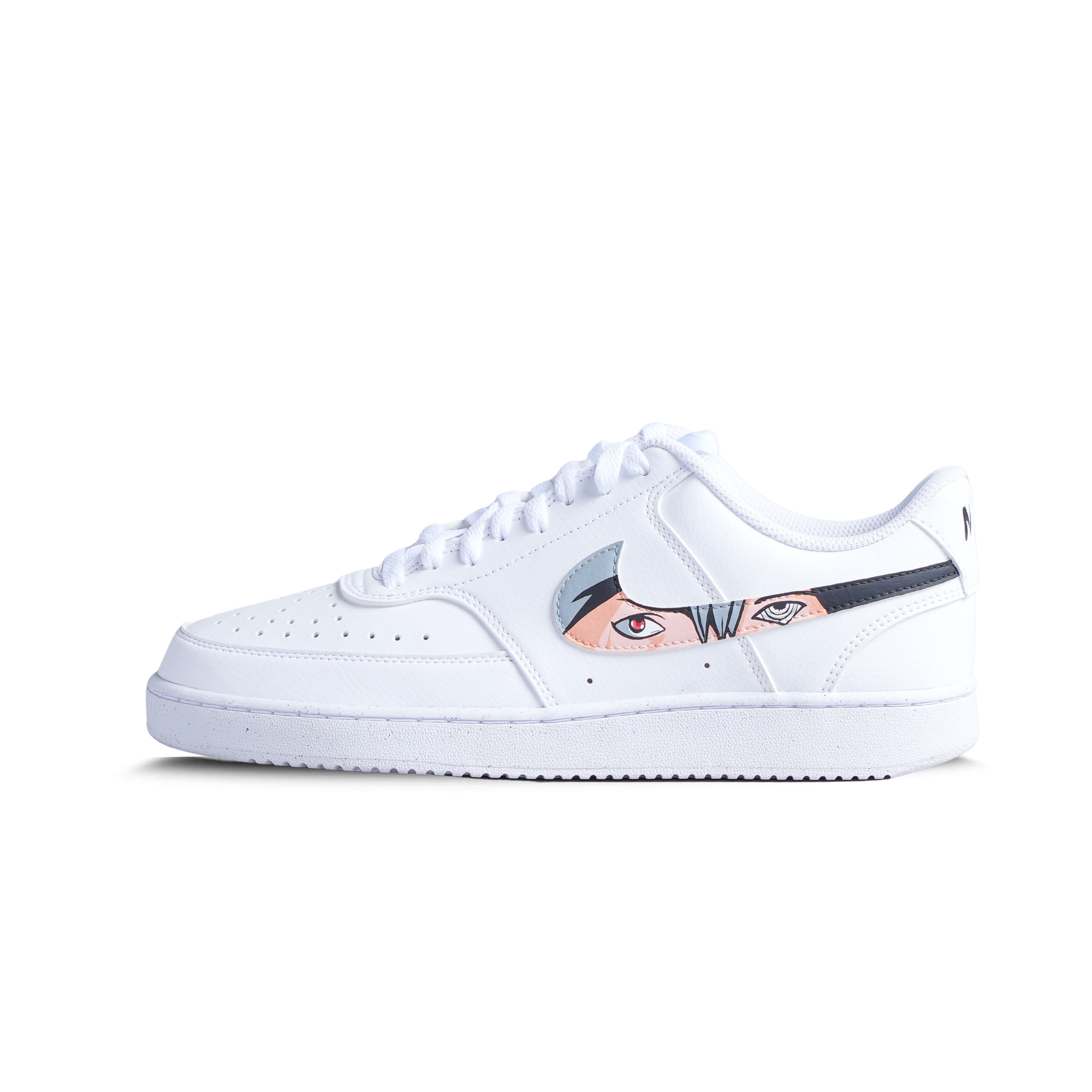 White streetwear sneaker with anime-inspired eye graphic on side, low-top design, minimalist style