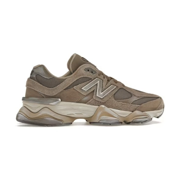 Brown New Balance sneaker with suede and mesh upper, chunky sole, side profile view