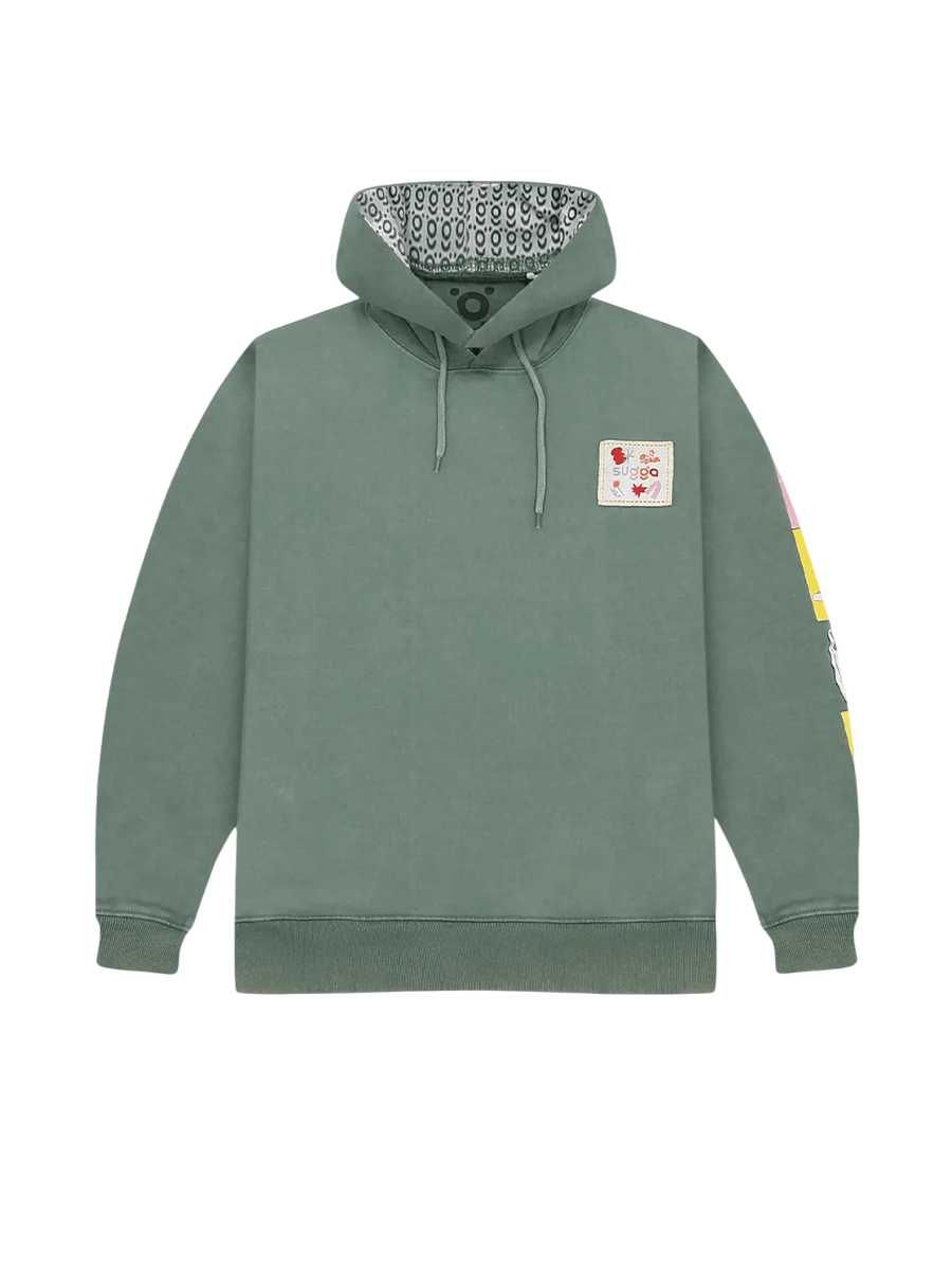 Green streetwear hoodie with patterned hood lining, chest patch, and graphic sleeve details
