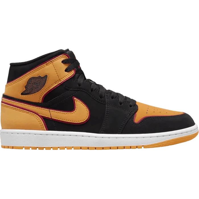 Black and orange mid-top sneaker with red accents and white sole, streetwear style.