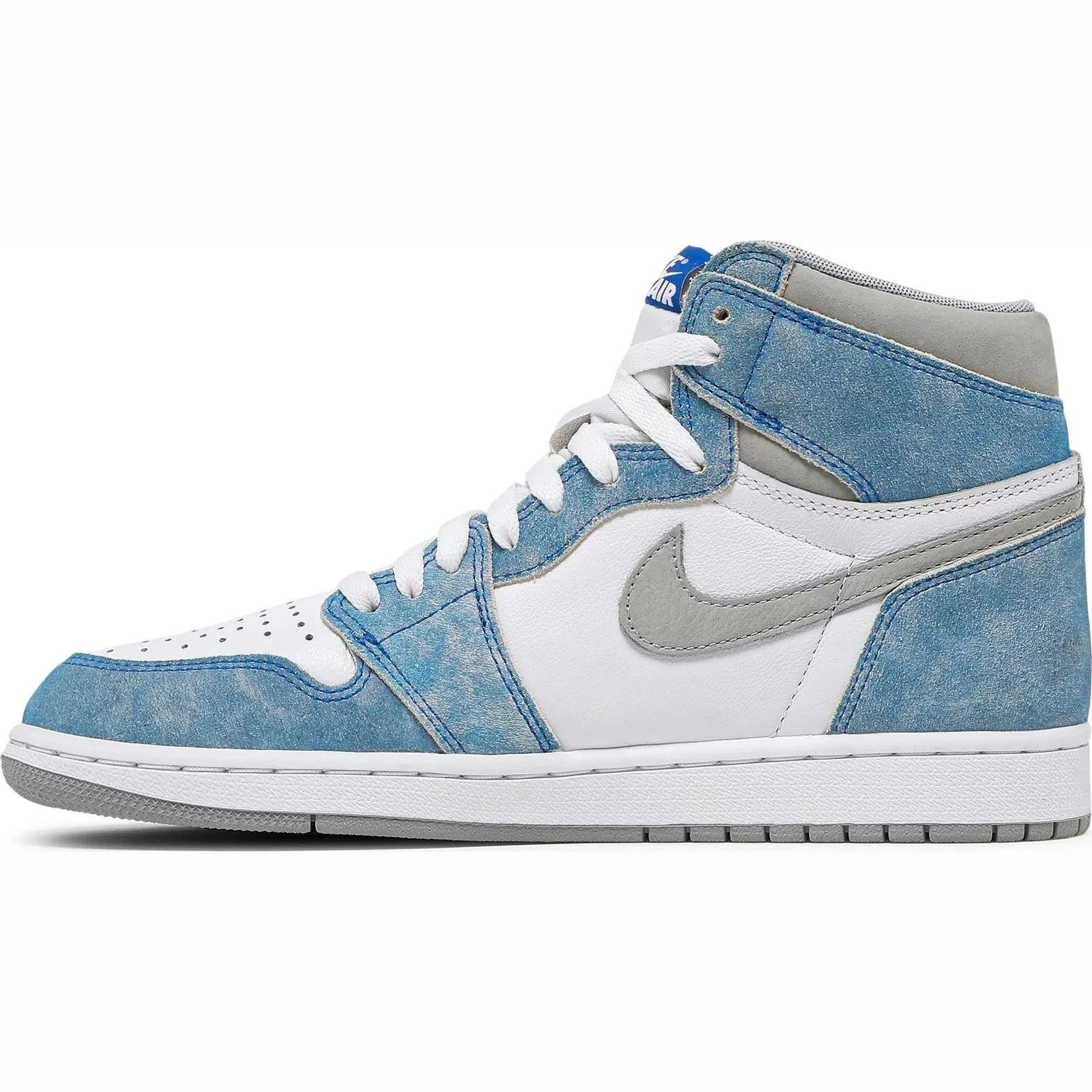 White and blue high-top sneaker with grey accents and white laces, side profile view
