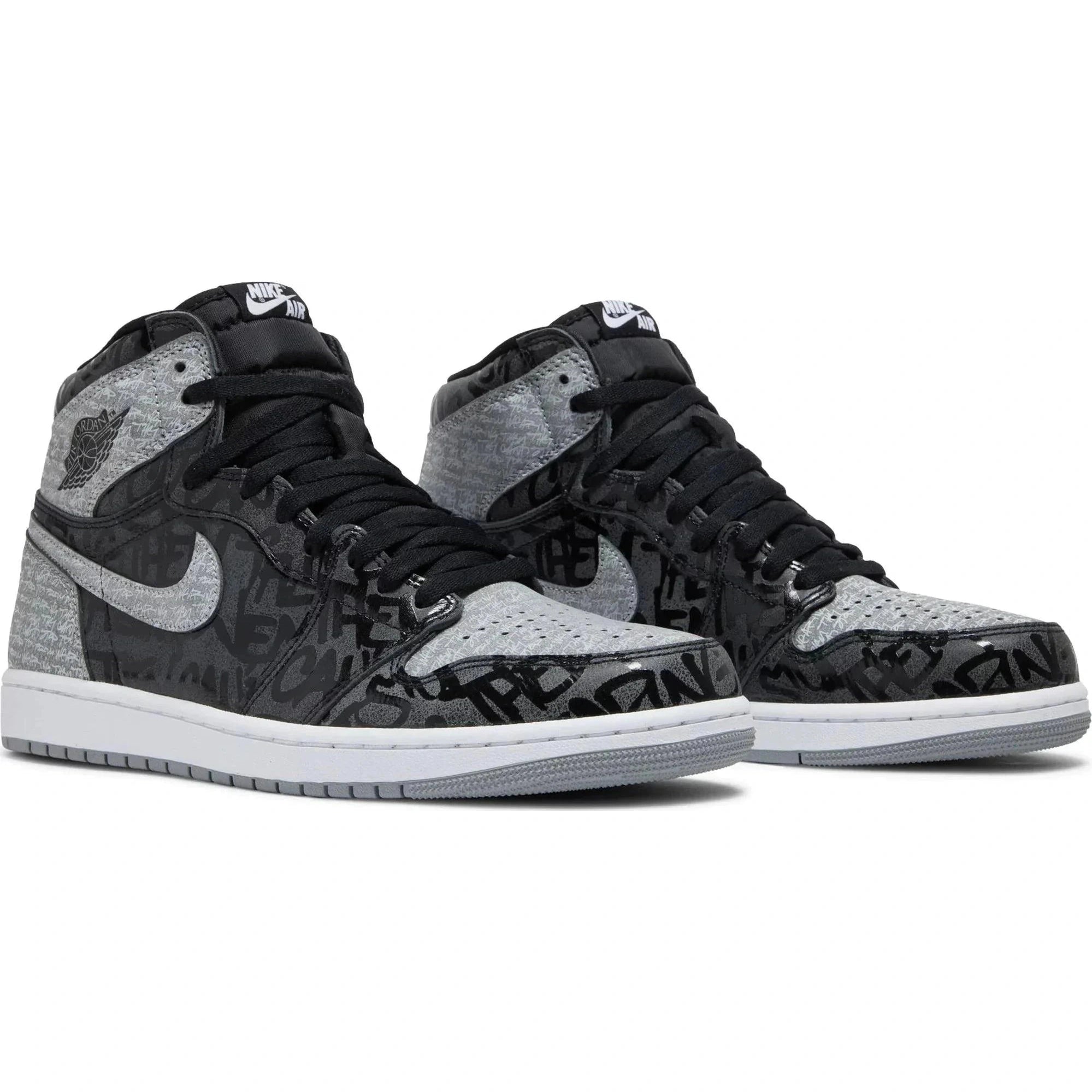 Gray and black Air Jordan 1 Retro High OG Rebellionaire sneakers with graphic text details