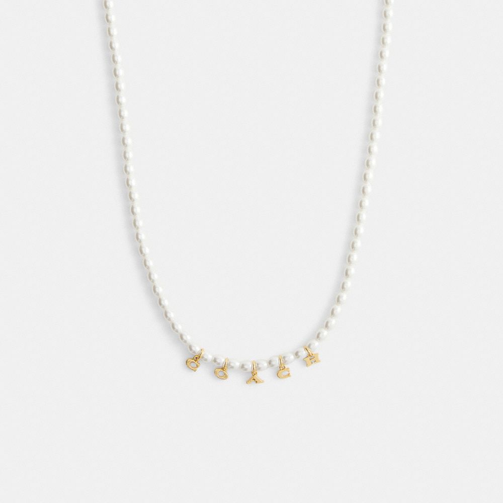 Coach Coach Charms Pearl Necklace Gold Pearl