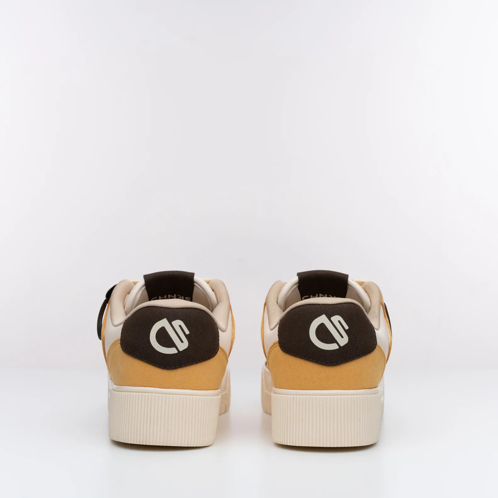 Rear view of Butterscotch CHNKS yellow sneakeBack view of Buttercotch CHNKS sneakers with CHNKS logo – yellow sneakers for everyday wearrs