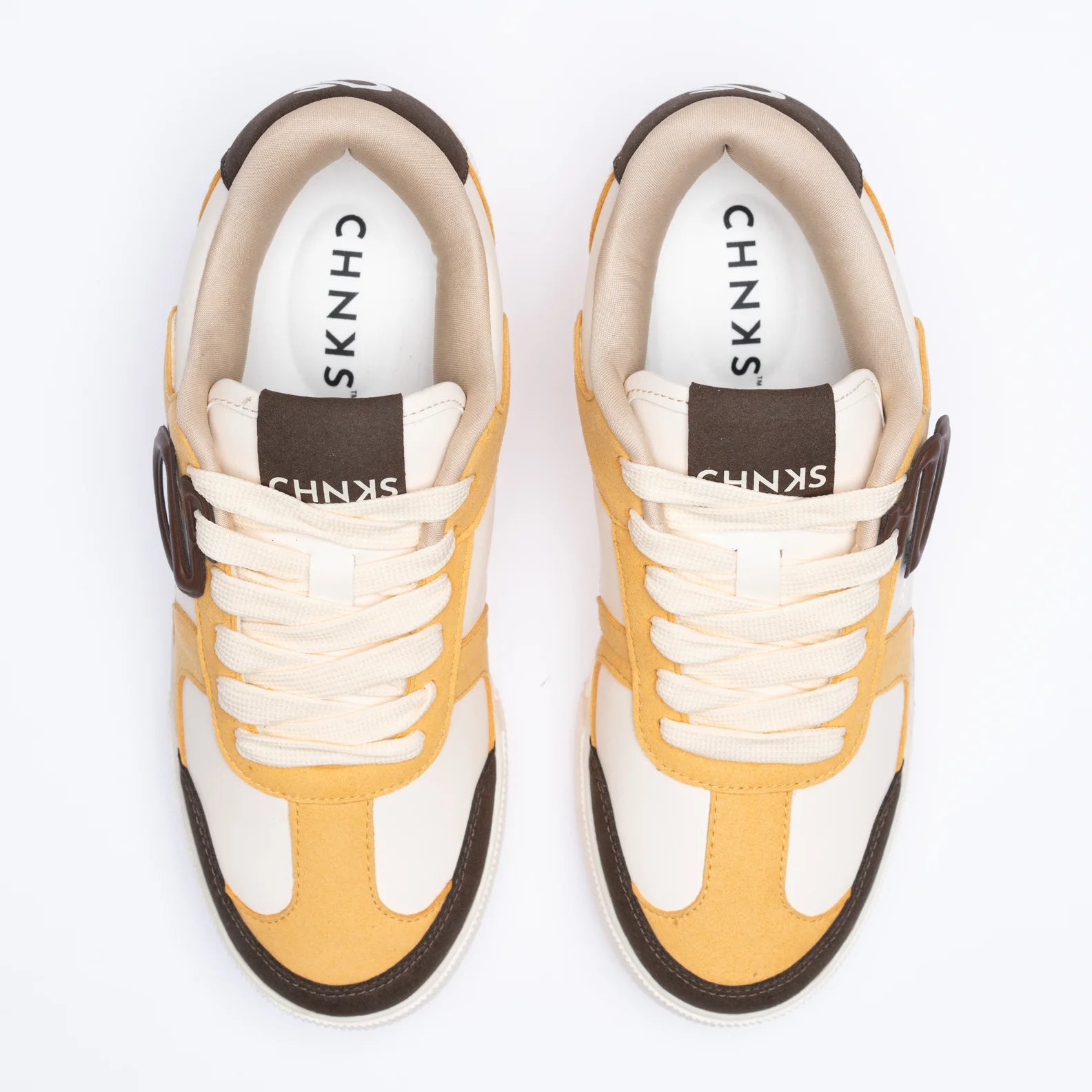 Top view of Buttercotch CHNKS sneakers – premium yellow upper with breathable design