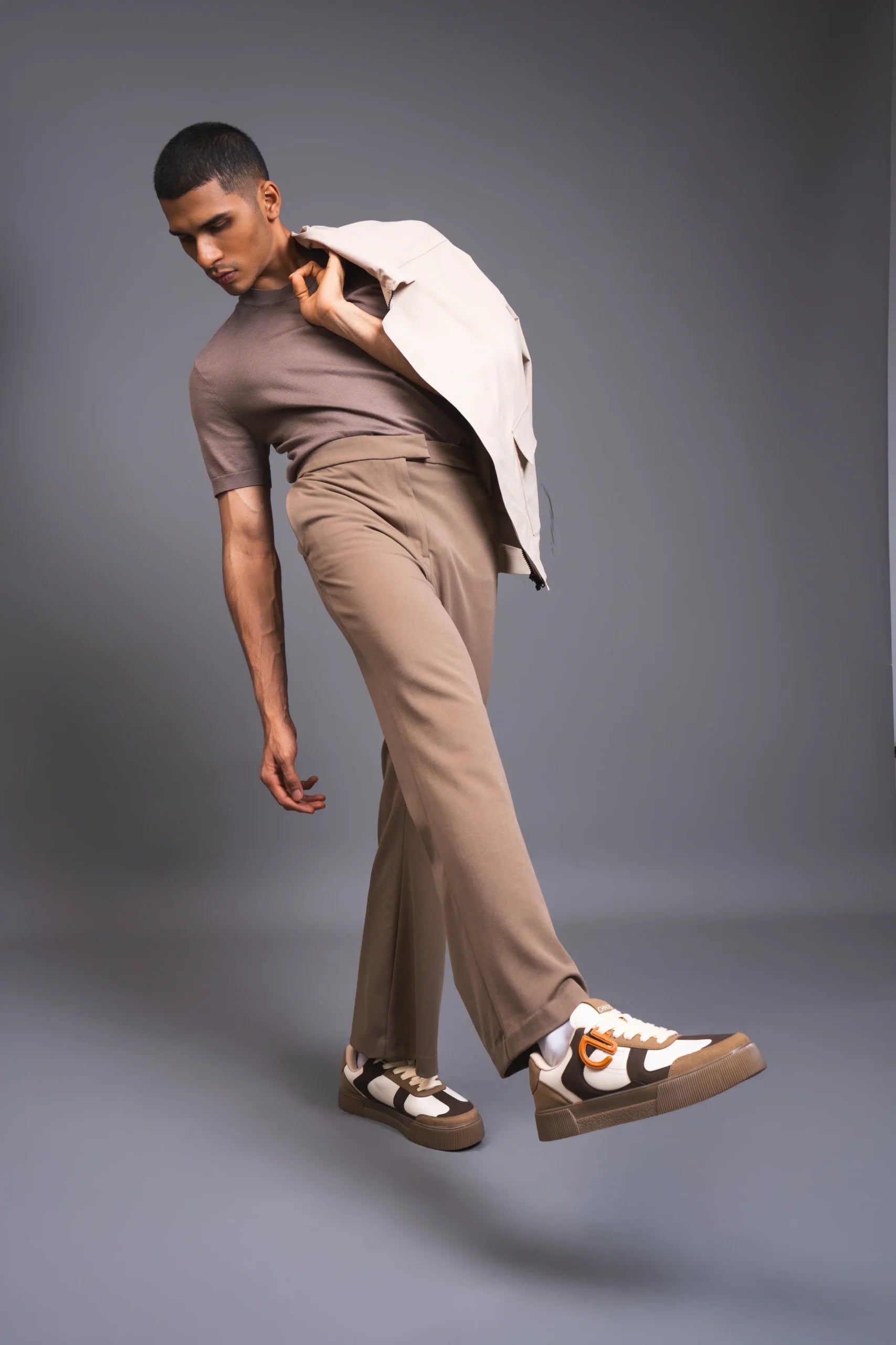 Man wearing Mocha CHNKS brown sneakers with brown outfit – casual sneakers for men