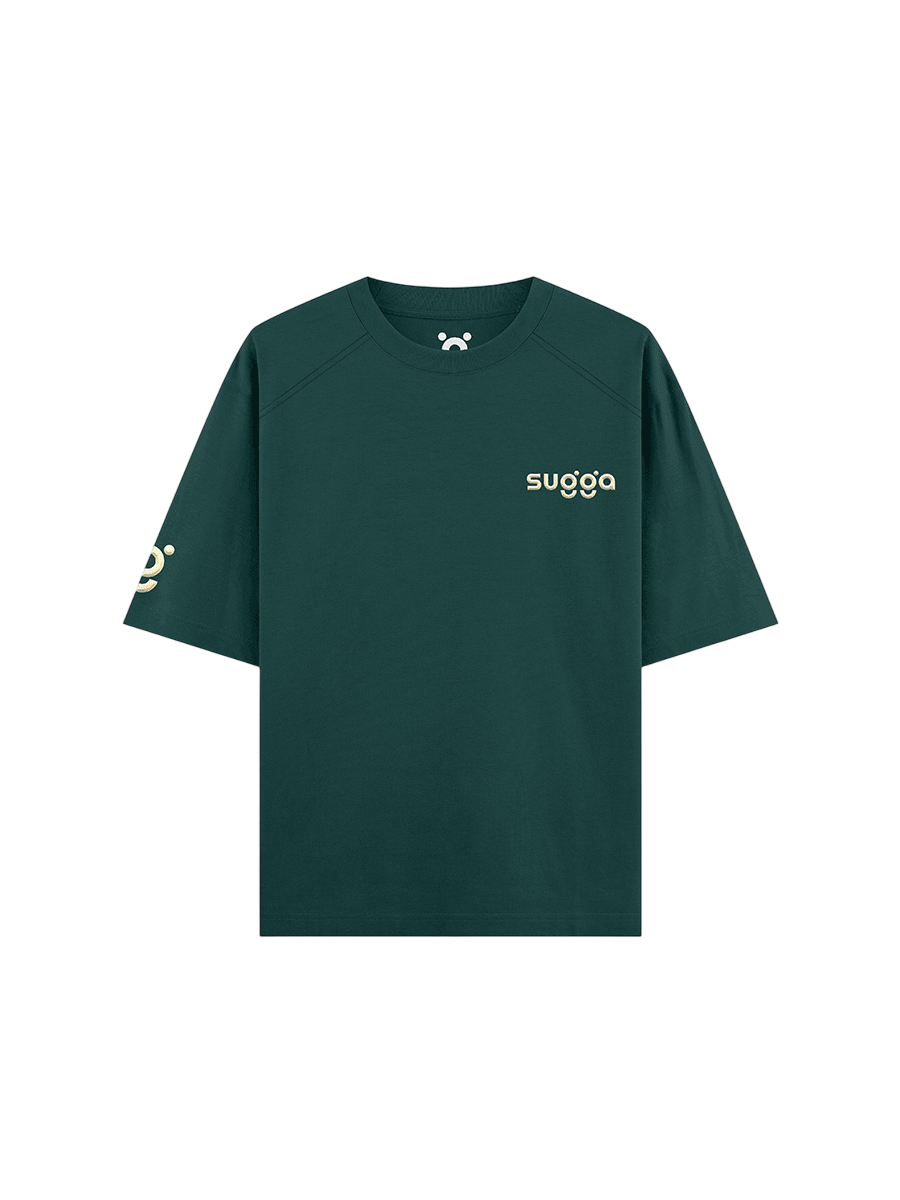 Dark green streetwear t-shirt with 'sugga' text and graphic design on front and sleeve.
