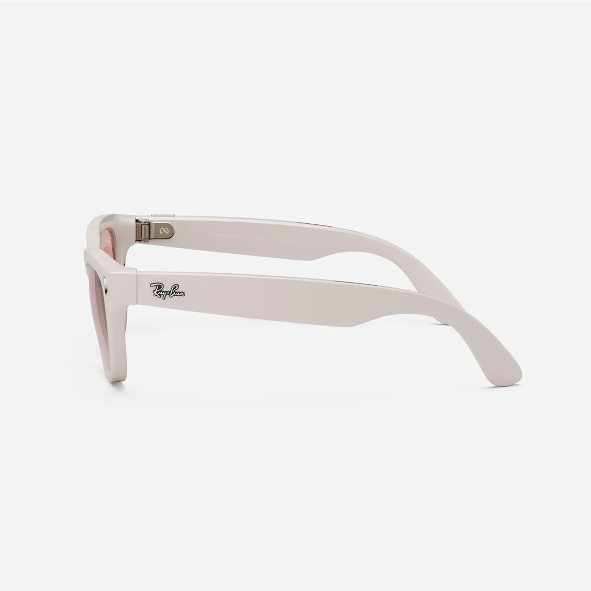 Side view of white designer sunglasses with pink lenses and bold frame