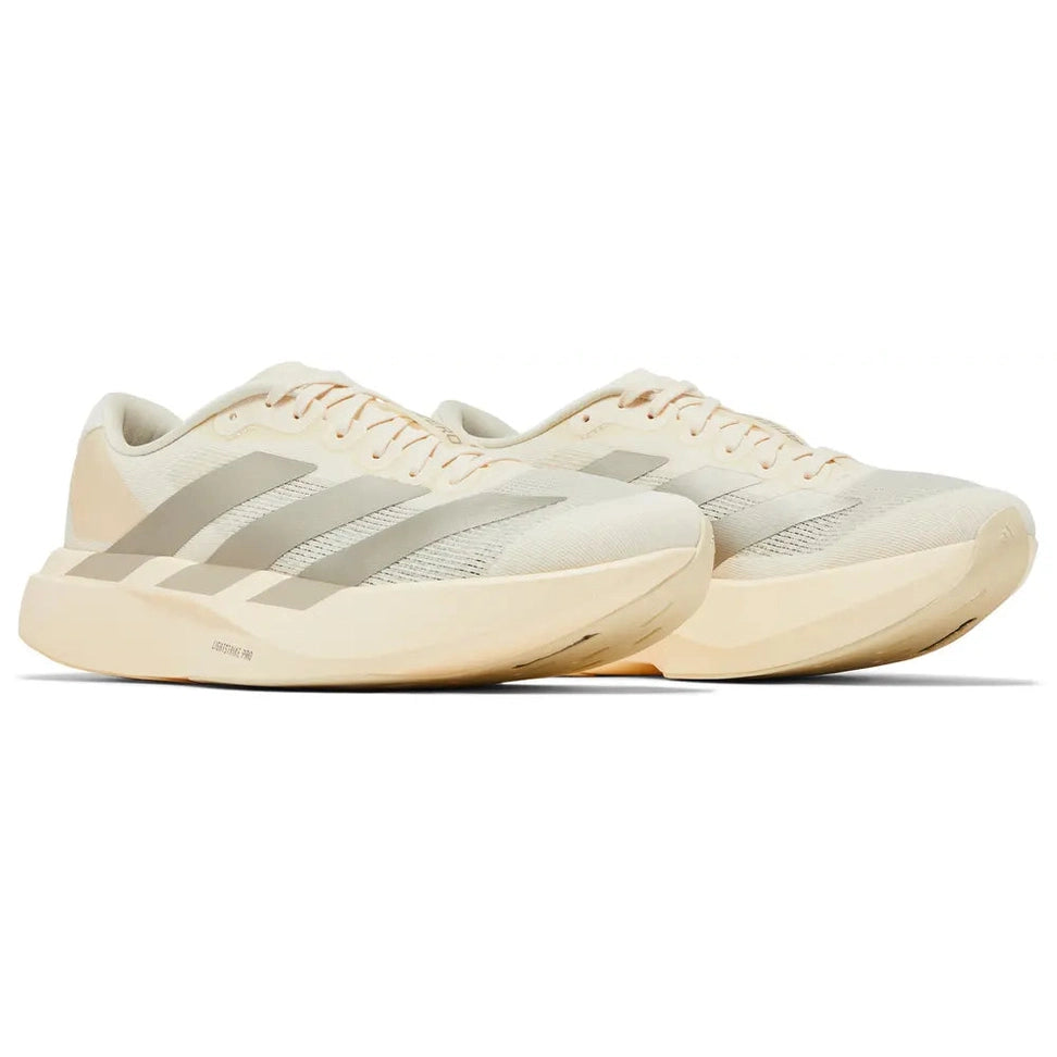 Beige lightweight running sneakers with mesh upper and neutral accents on a white background
