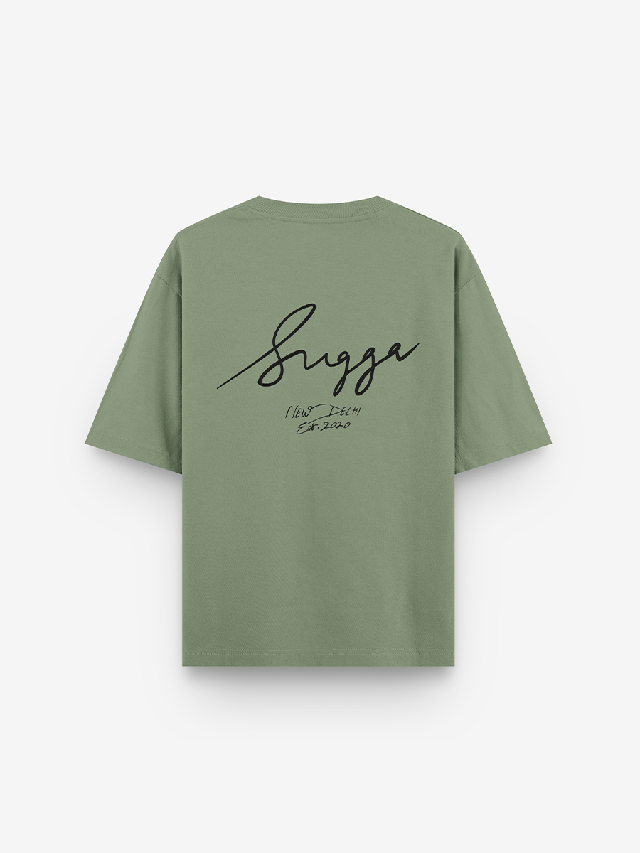 Sage green streetwear T-shirt with black script graphic and 'New Delhi Est. 2020' on back.