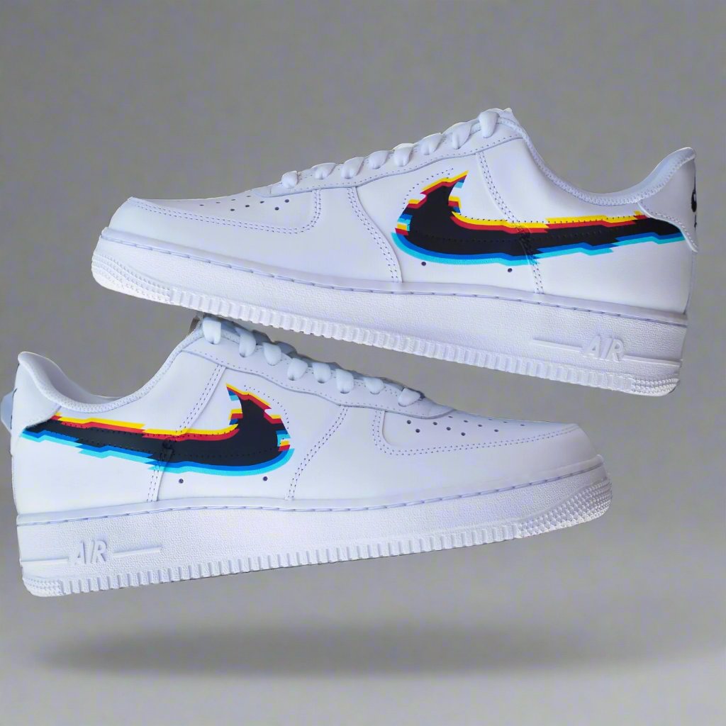 White streetwear sneakers with multicolor glitch swoosh graphic, floating on a gray background