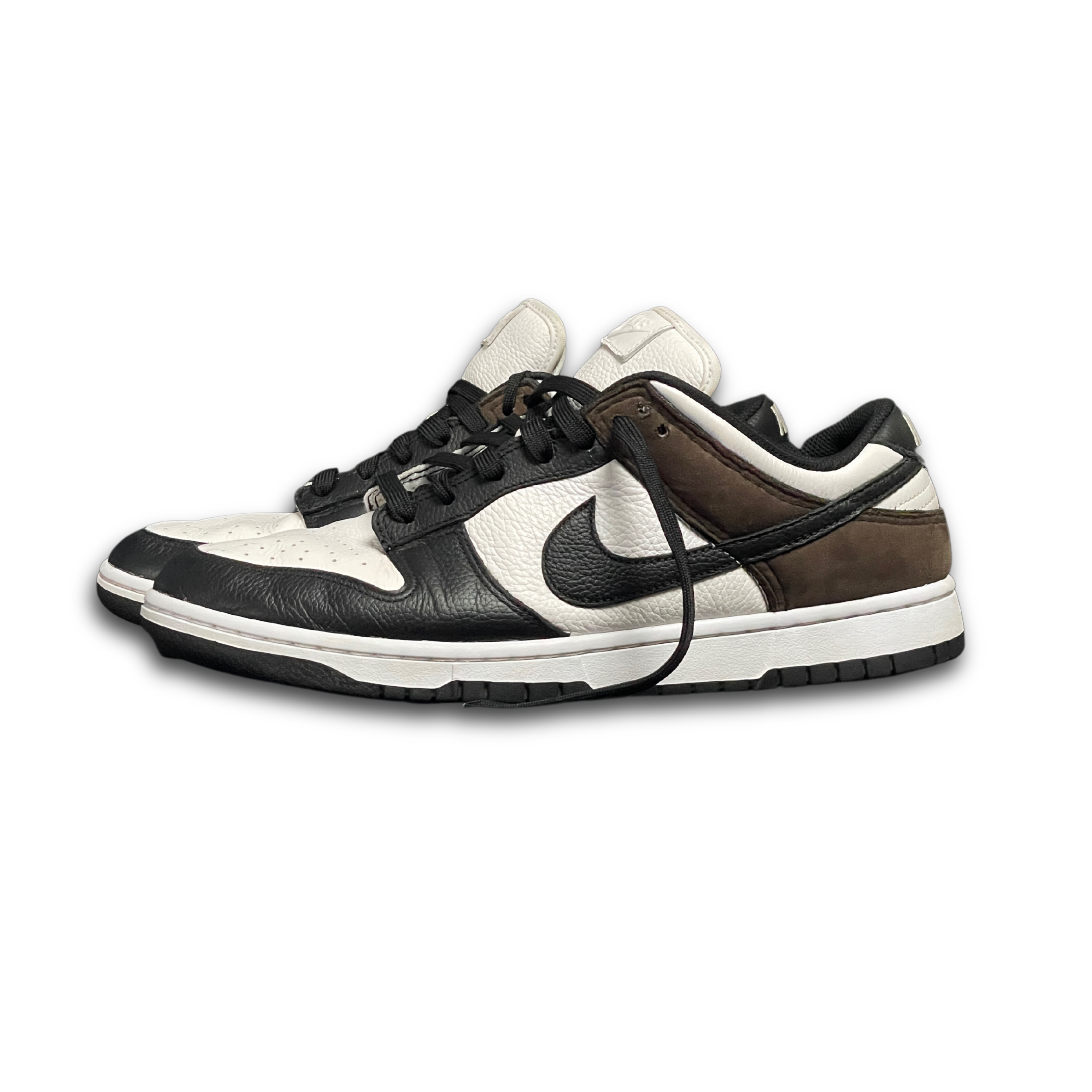 Black, white, and brown Nike Dunk Low sneakers with leather and suede details, streetwear footwear