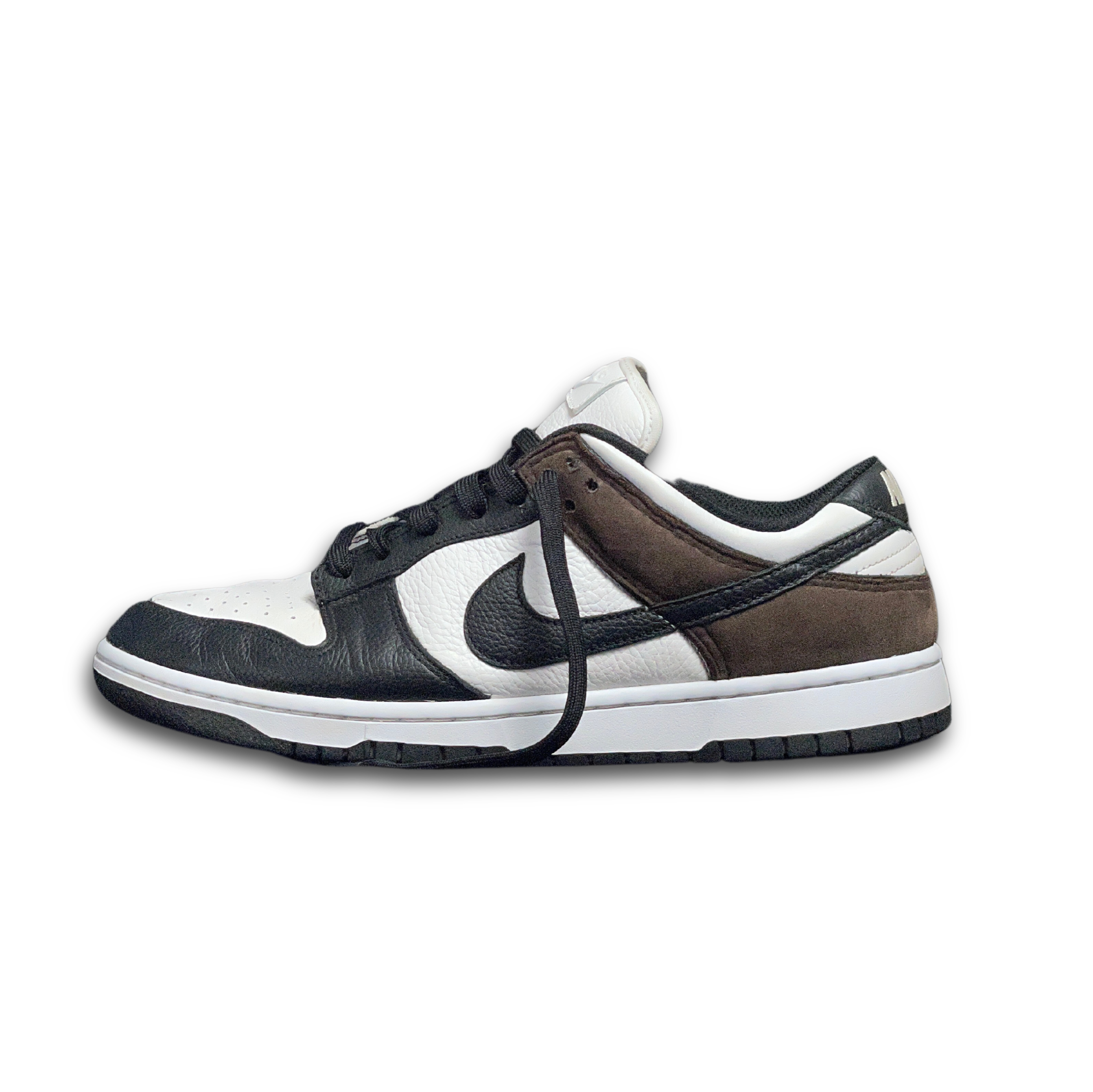 Black, white, and brown low-top Nike Dunk sneaker with leather and suede panels