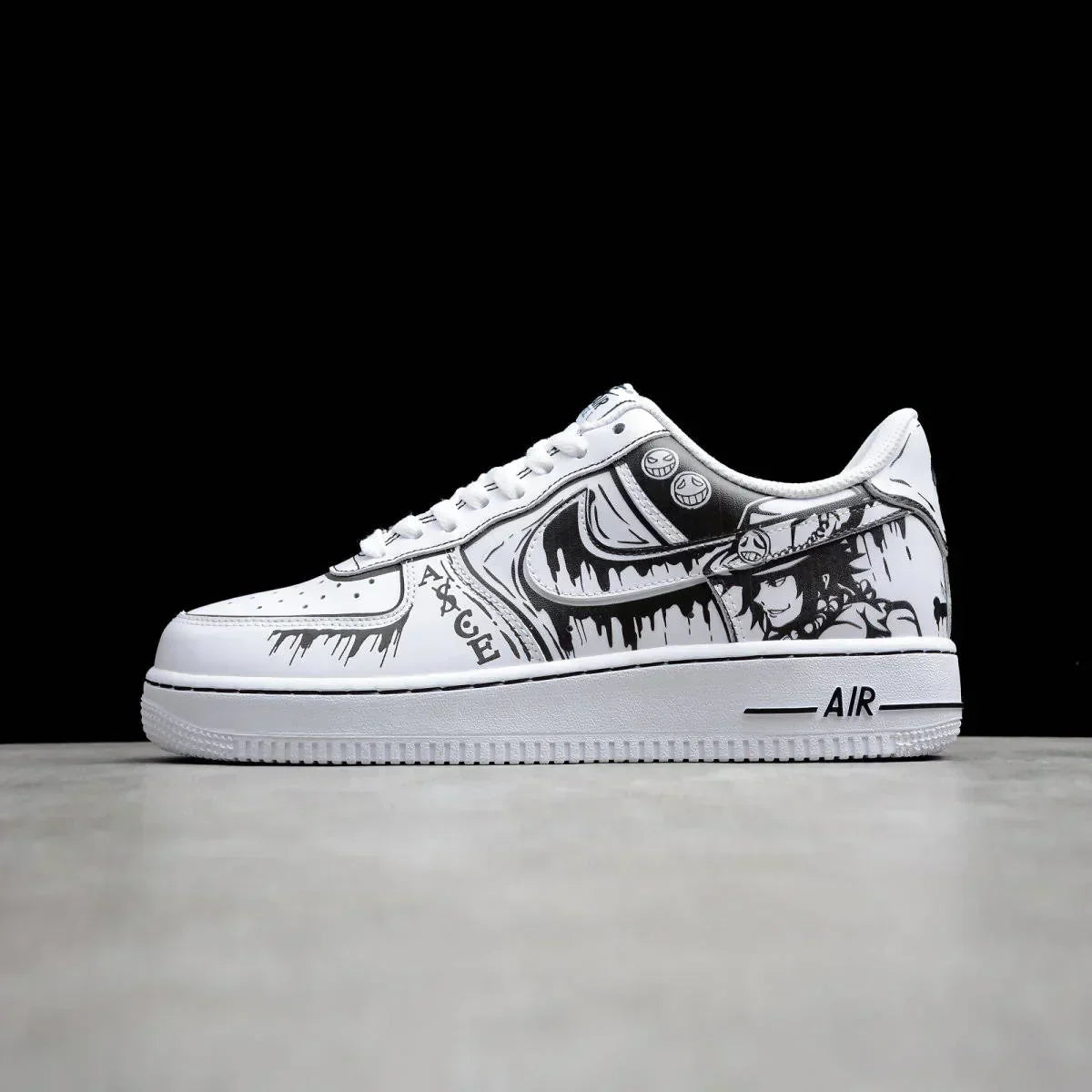 White custom sneaker with black anime character artwork and graffiti details, streetwear style