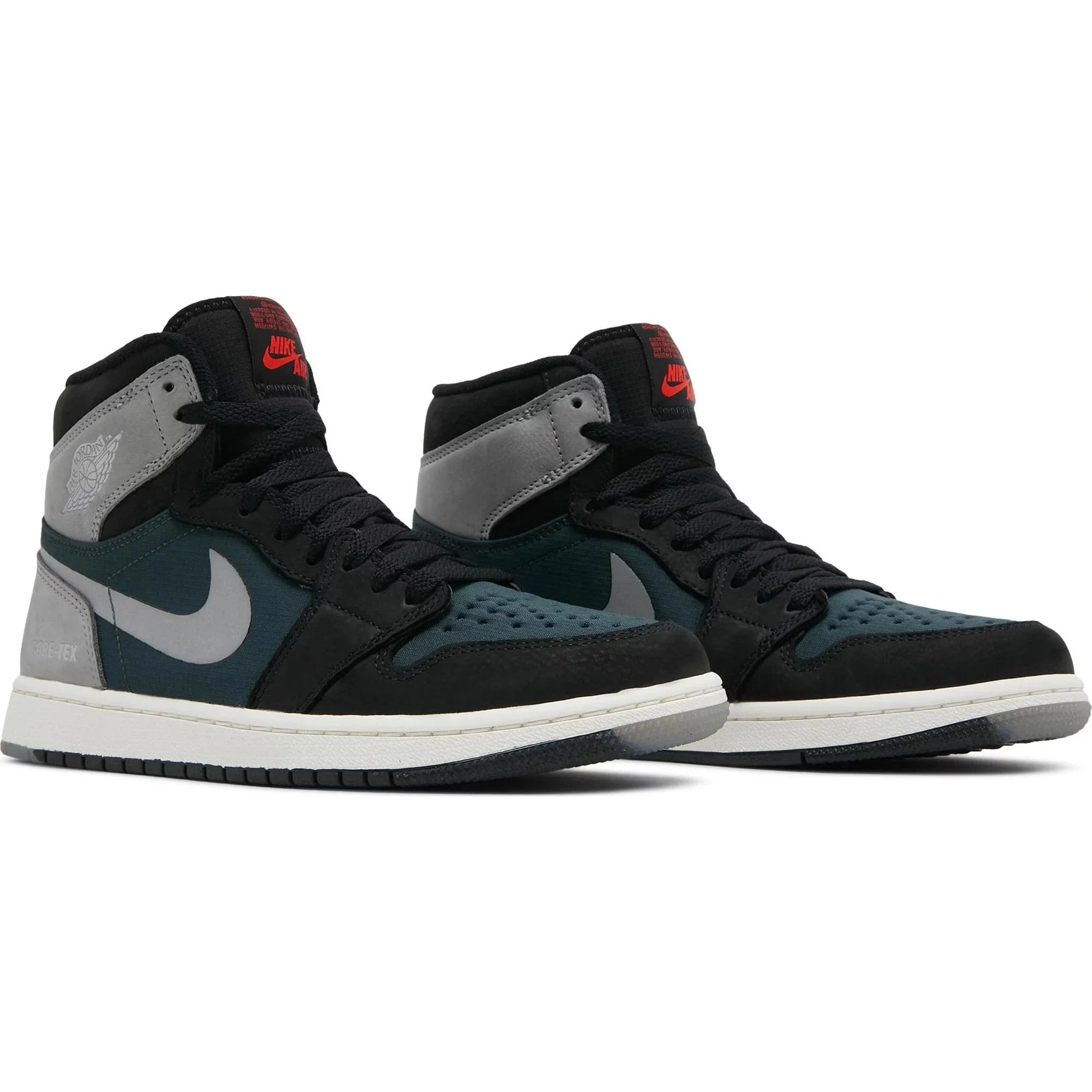 High-top black, grey, and teal sneakers with red logo, white soles, and streetwear style.