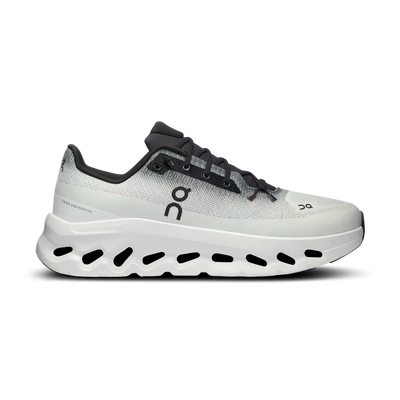 Light grey and black designer sneaker with thick, ventilated white sole on white background