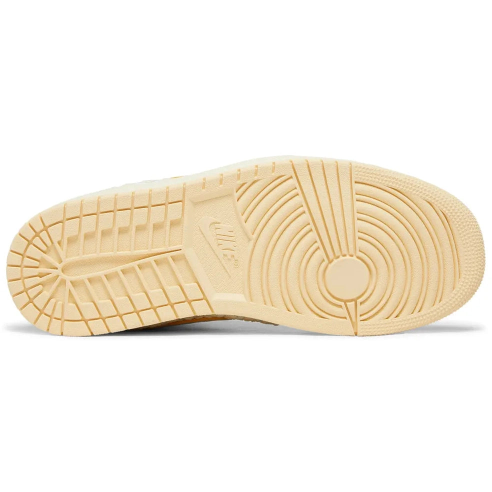 Beige Nike sneaker outsole with textured tread, streetwear shoe detail