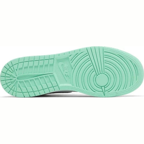 Mint green Nike sneaker outsole with circular traction pattern, streetwear footwear detail