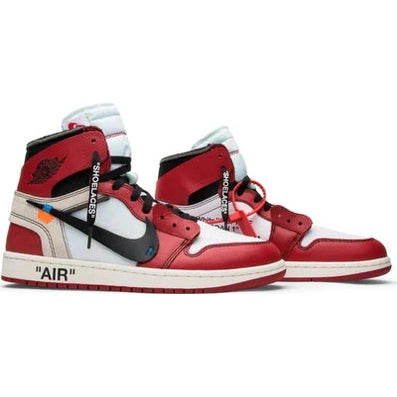 Red, white, and black high-top designer sneakers with signature branding and text details