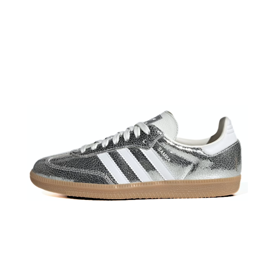 Silver cracked leather Adidas Samba sneaker with white stripes and gum sole on white background