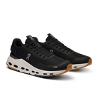 Black On CloudTec streetwear sneakers with white sole and gum outsole, side view.