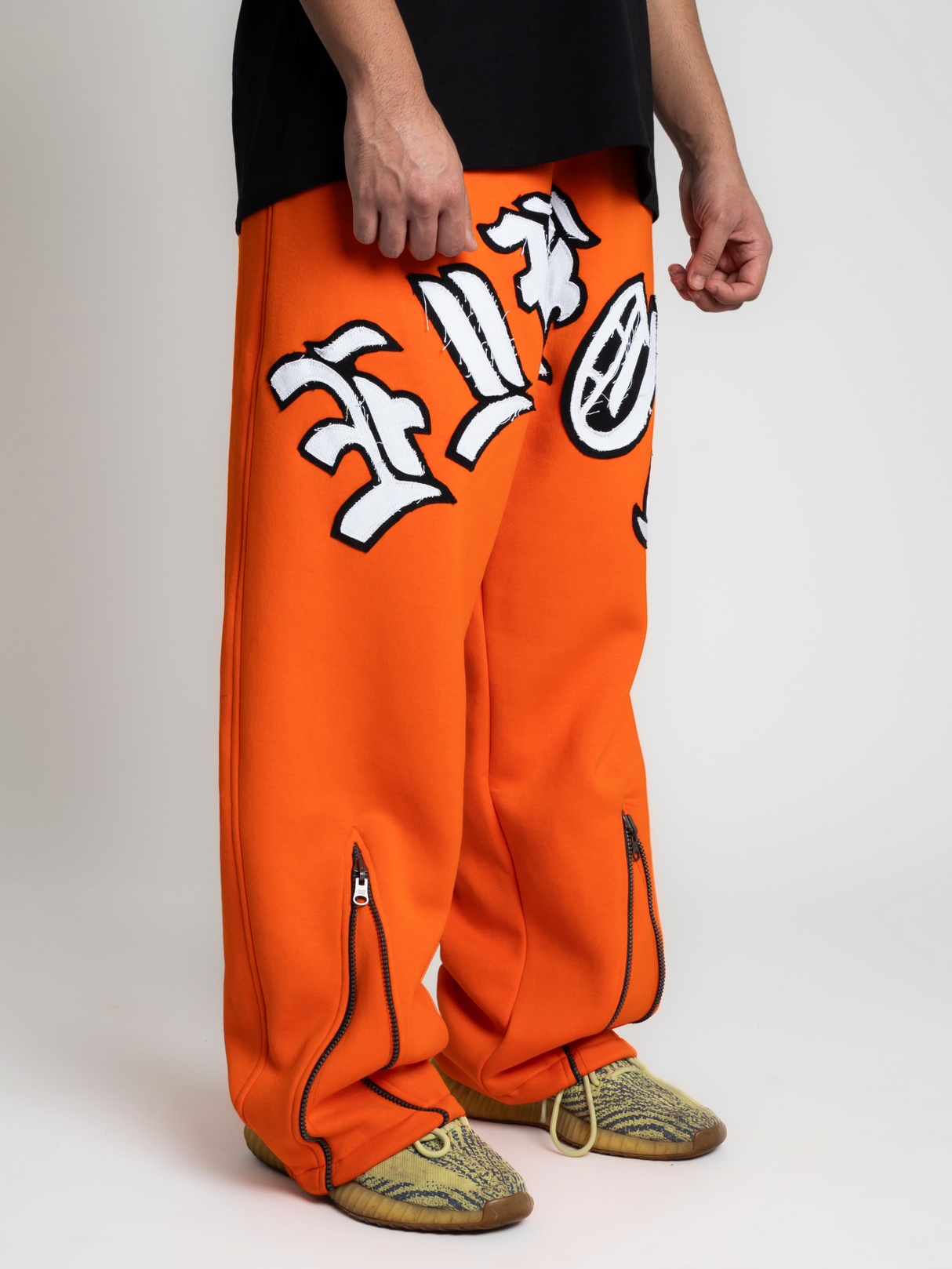 Orange Chainsaw Joggers