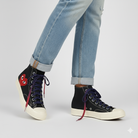 Black High top shoes worn with Red - Purple - Light Pink Gradient shoelaces on the shoe