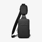 Michael Kors Cooper Pebbled Leather and Signature Logo Sling Pack with Pouch Black