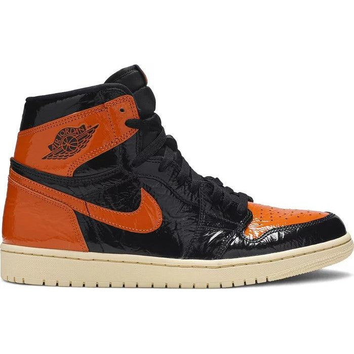 High-top black and orange leather sneaker with cream sole, streetwear footwear