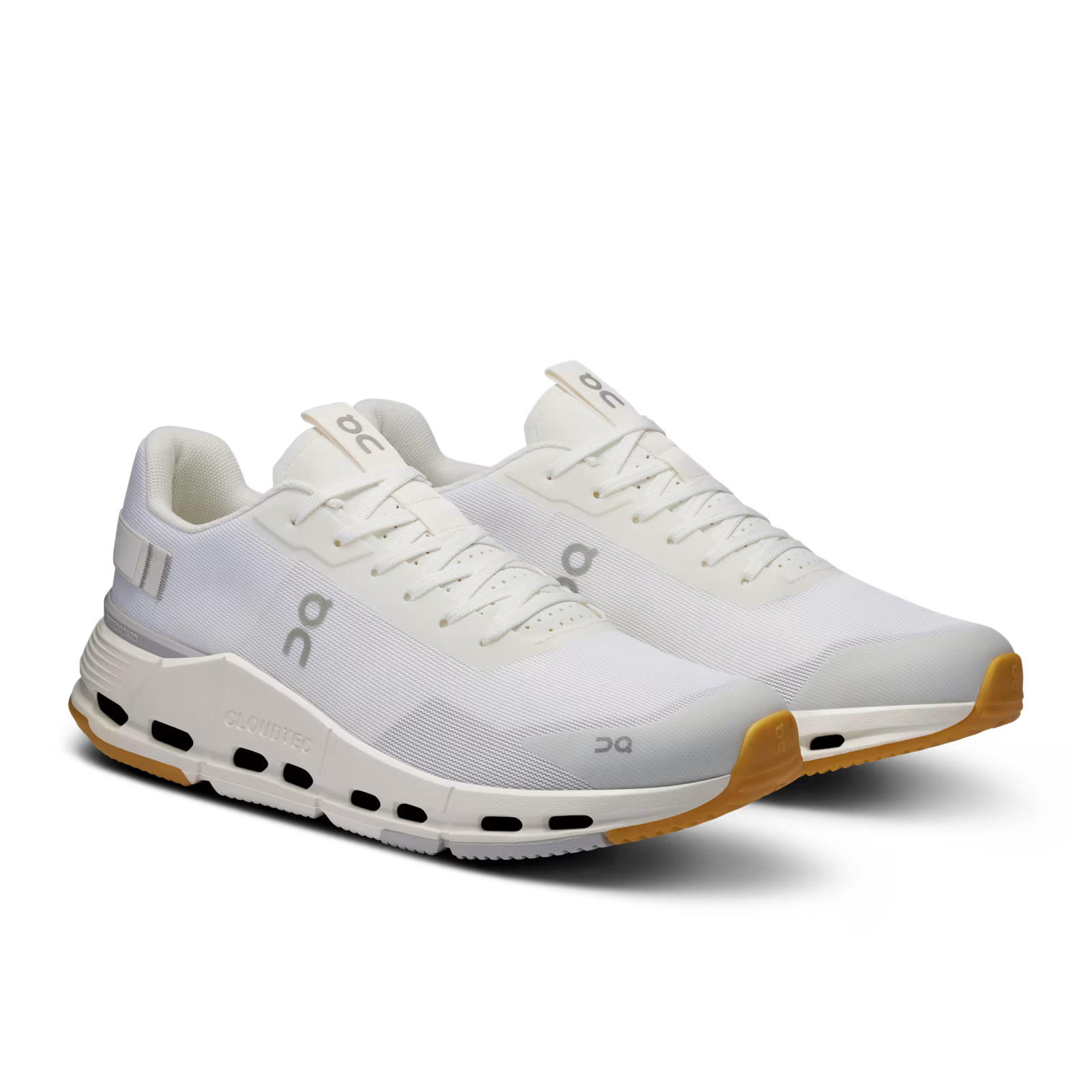 White On running sneakers with mesh upper, gum soles, and signature CloudTec cushioning