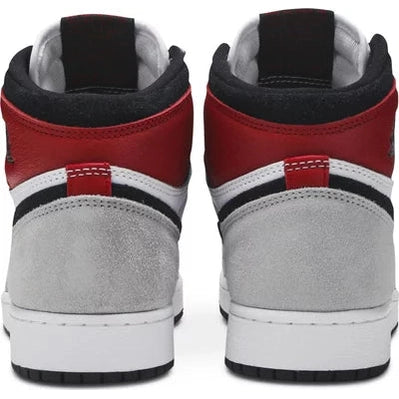 Rear view of two-tone high-top sneakers with red, white, grey, and black details on white background.
