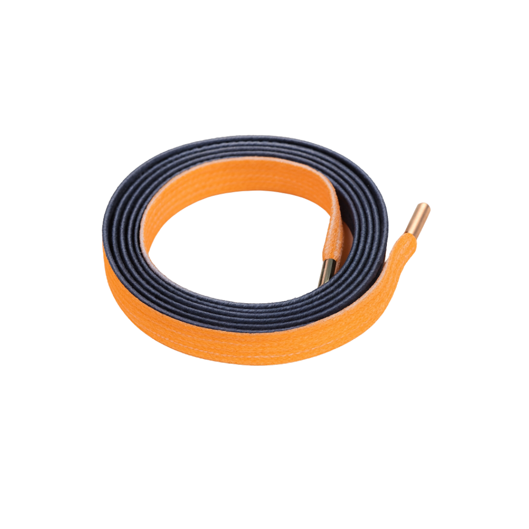Gradient Shoelaces that go from deep black to vibrant orange shown in a white background 