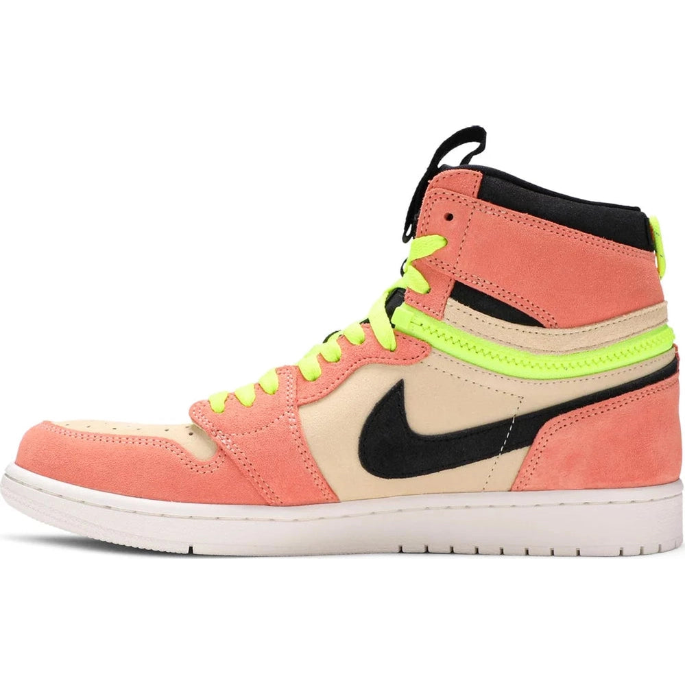High-top sneaker with pink suede overlay, neon yellow laces, black swoosh, and white sole