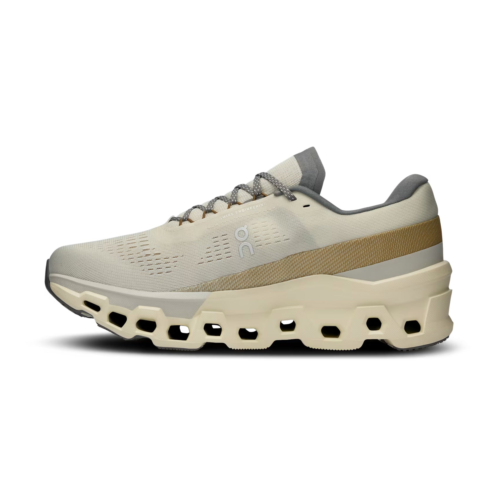 Beige and gray streetwear sneaker with cushioned, hexagonal sole and mesh upper