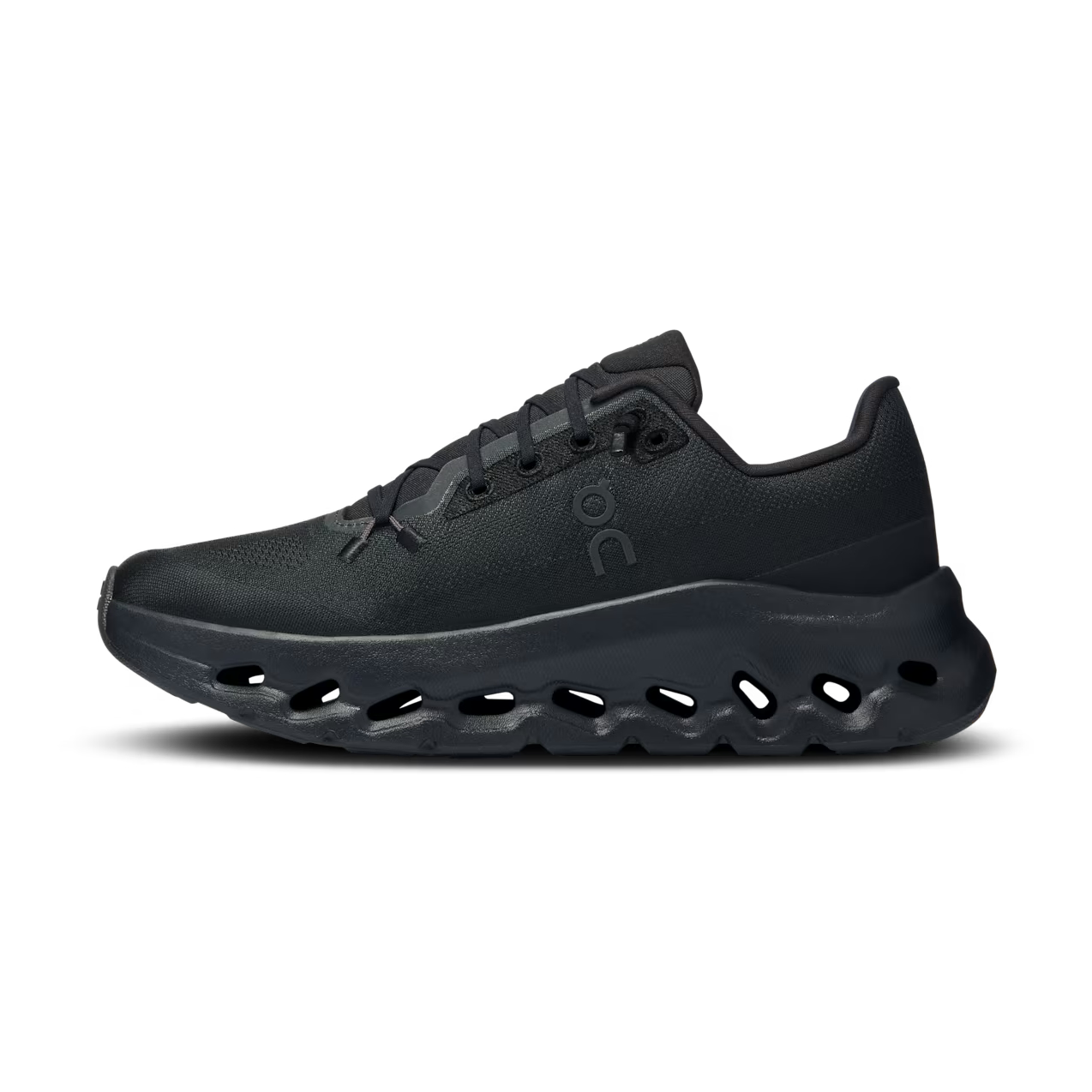 Black designer sneaker with cushioned sole and mesh upper for streetwear fashion