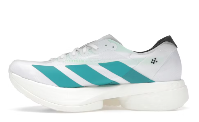 White sneaker with green stripes on a white background