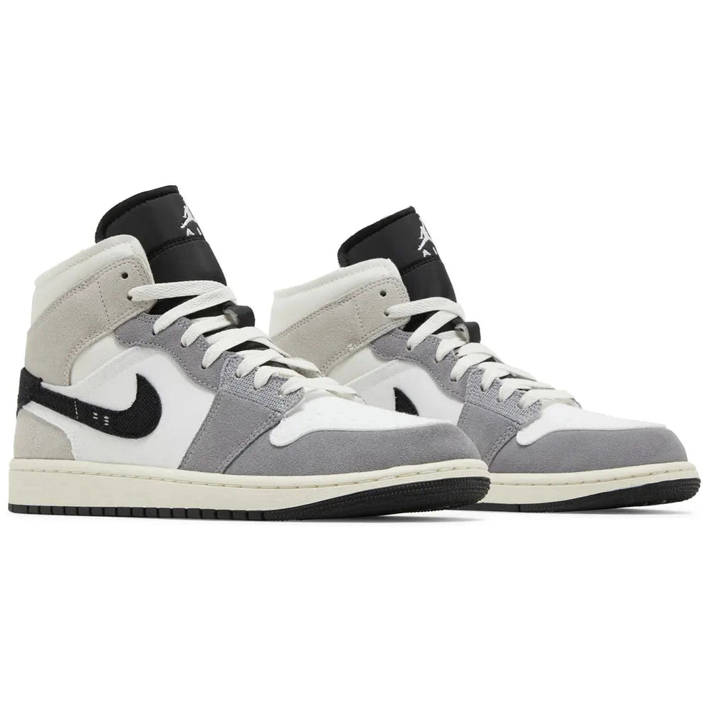 Air Jordan 1 Mid SE Craft Inside Out sneakers in grey, white, and black suede and leather