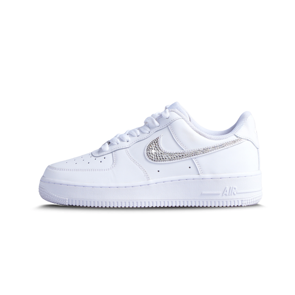 White low-top sneaker with rhinestone embellished Swoosh, classic streetwear style