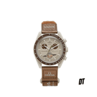 Beige and brown Swatch Omega Speedmaster MoonSwatch wristwatch with tachymeter bezel on brown strap