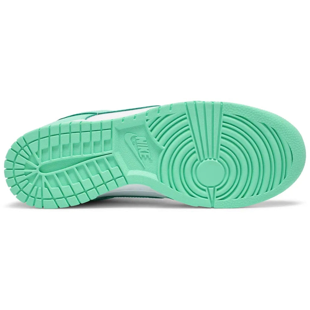 Mint green Nike shoe sole with textured grip, shown on a white background, streetwear footwear