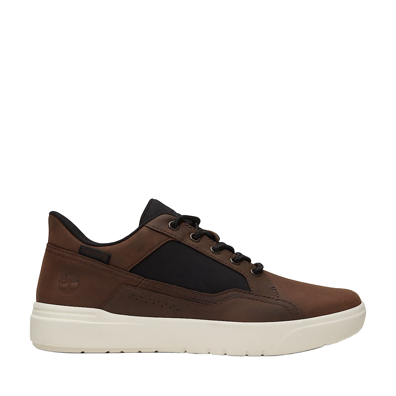 Brown sneaker with black accents on a white background