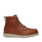 Brown leather boot with white sole on a light gray background