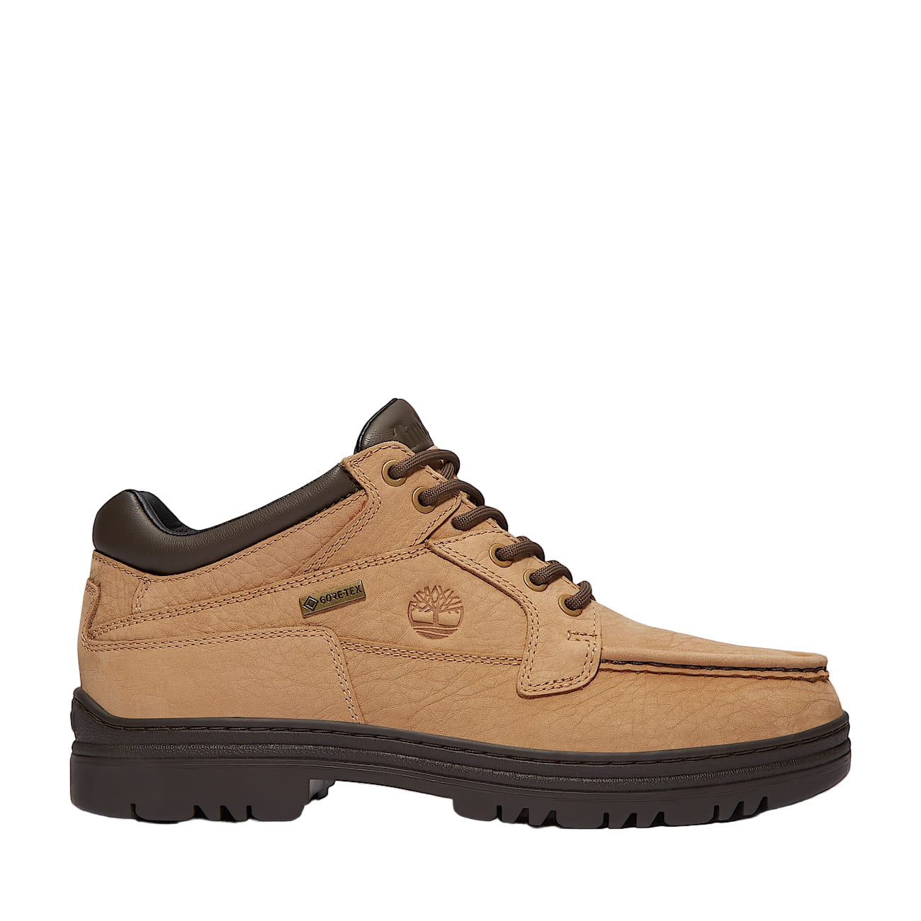 Tan sneaker with brown accents on a white background