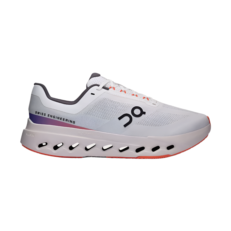 White designer running sneaker with mesh upper, thick cushioned sole, and side logo