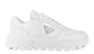 White Prada sneaker on a light gray background