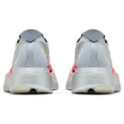 Rear view of silver and neon running sneakers with thick midsole and modern design